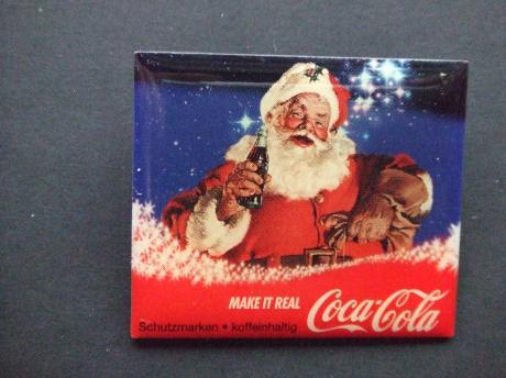 Coca Cola kerstman drinkt cola